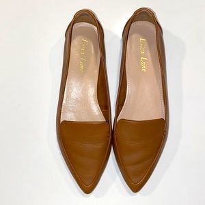 Brown flats in size 6
